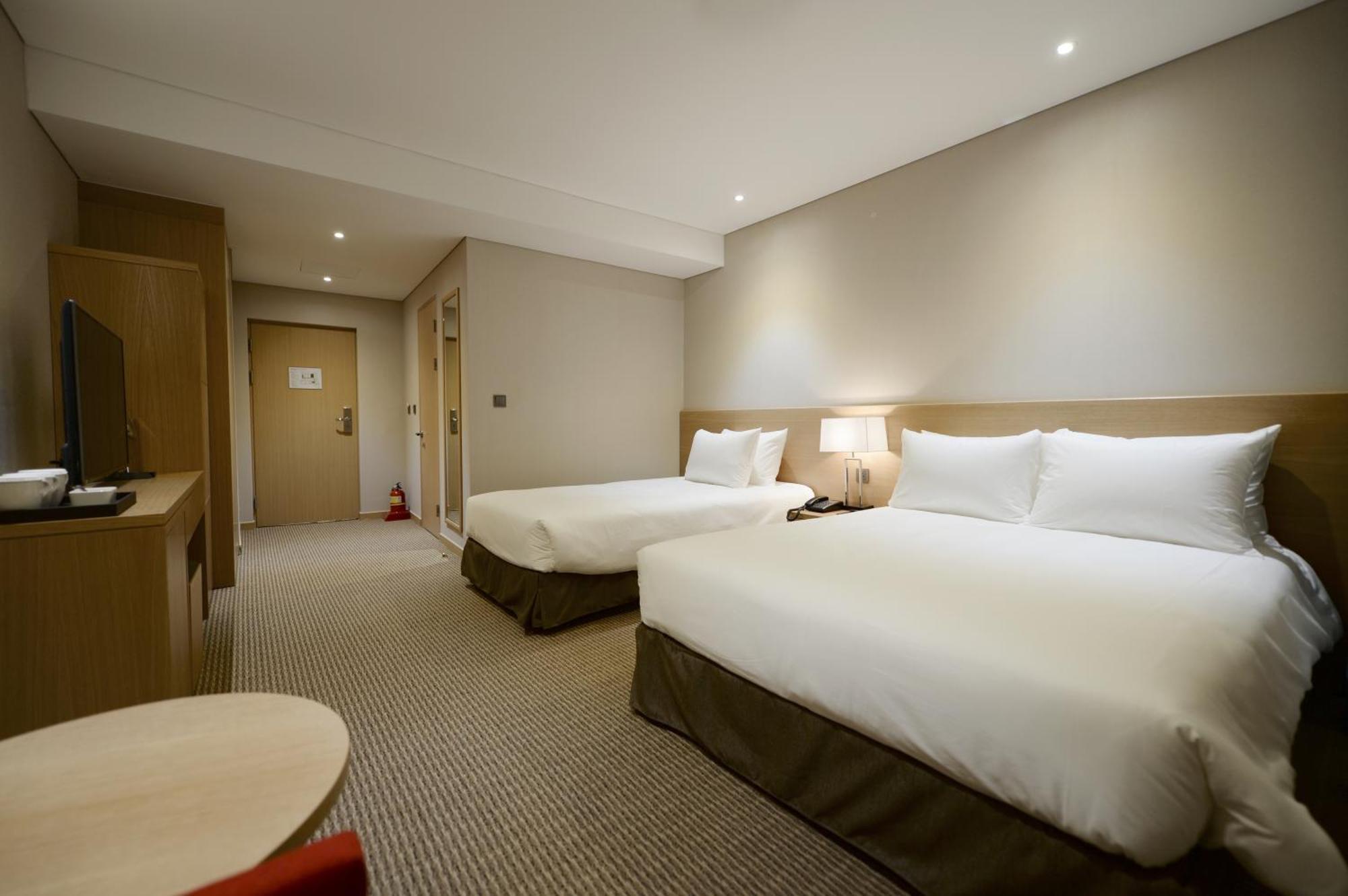 Hotel New Oriental Myeongdong Сеул Номер фото