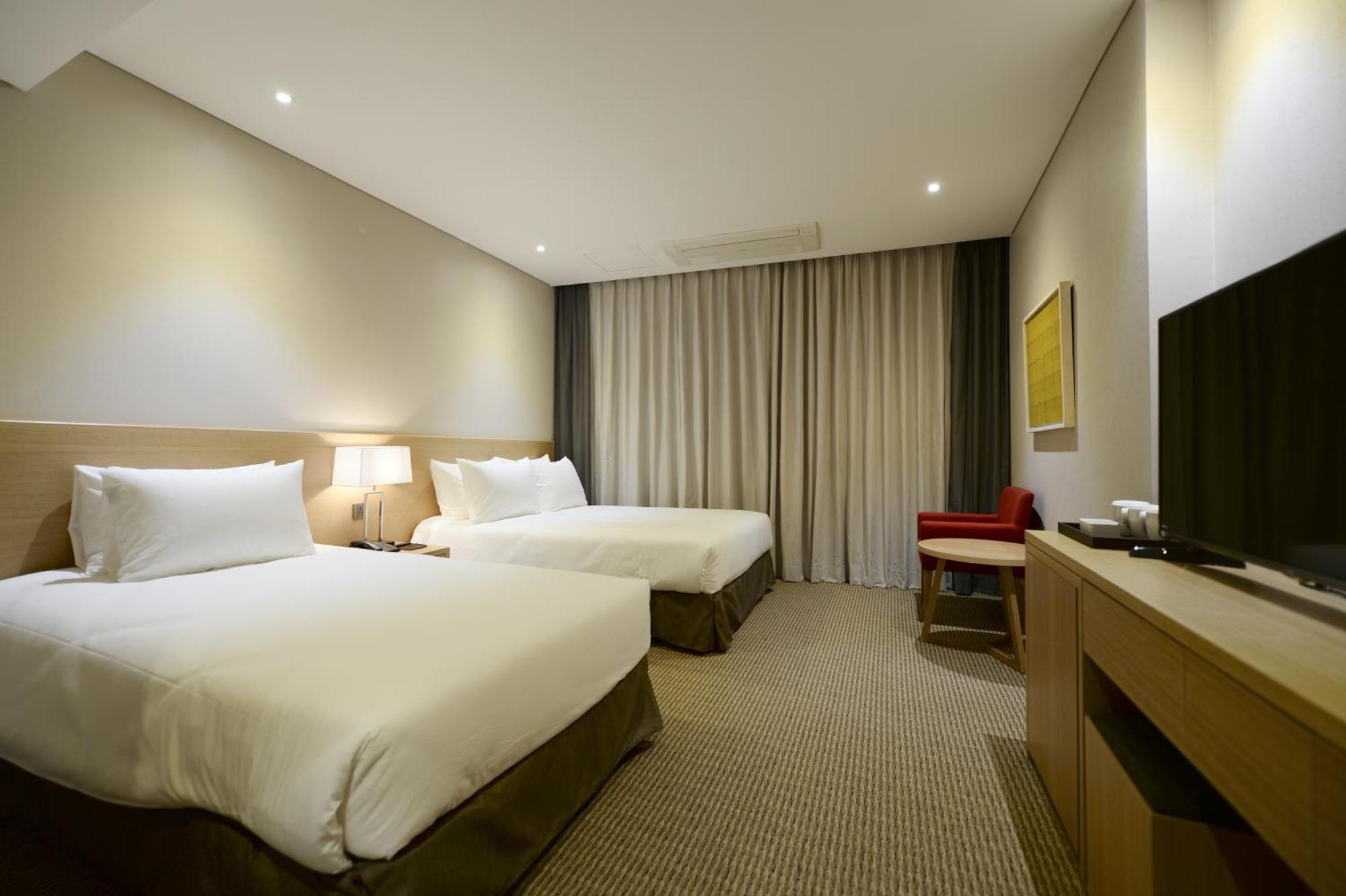 Hotel New Oriental Myeongdong Сеул Номер фото